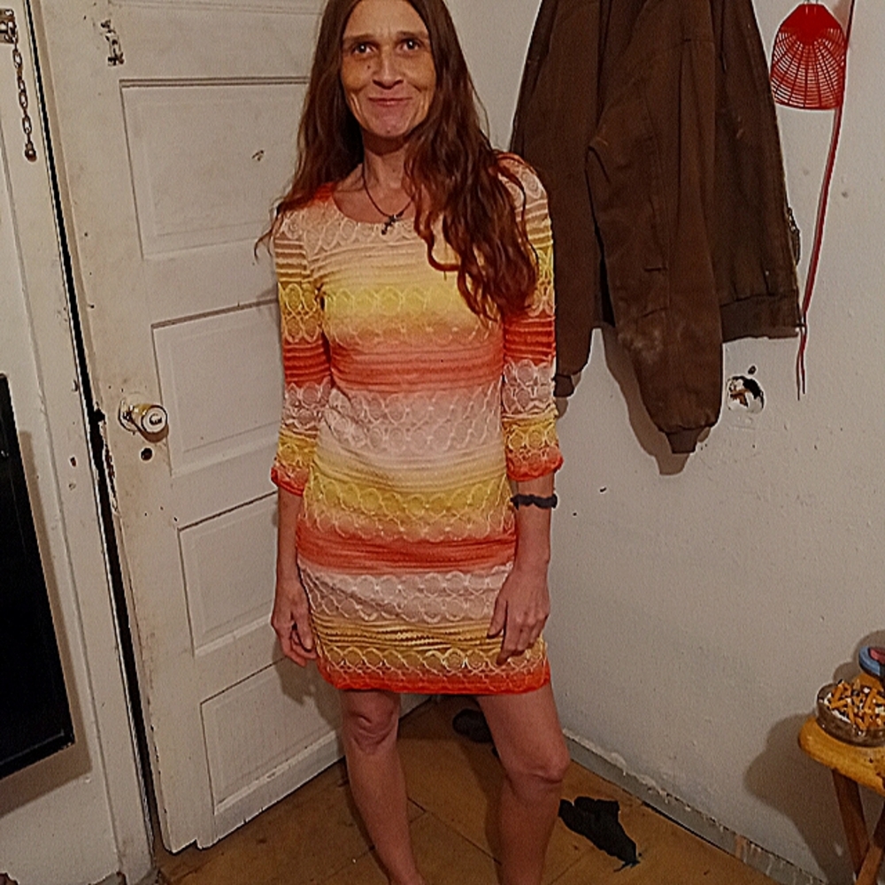 Nice lace dress, never worn size small by C, half sleeves and silk inside gown